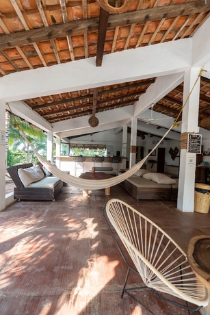 Imagen de la habitación del Hotel La Playita Beach House. Foto 8