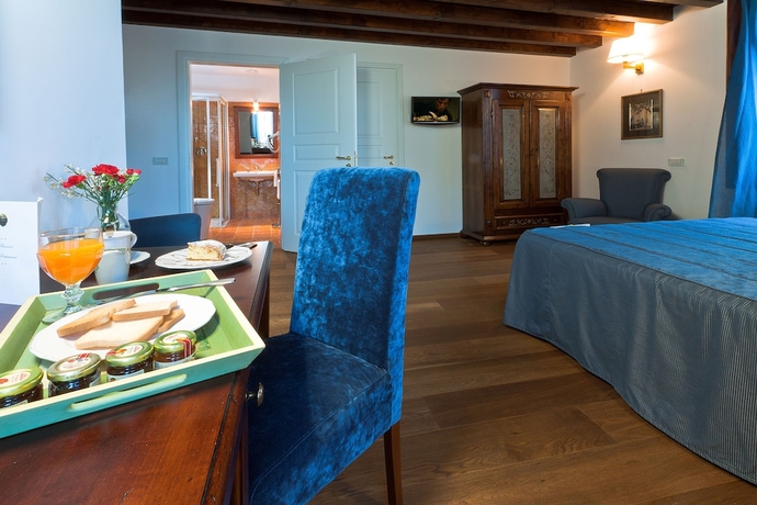 Imagen de la habitación del Hotel La Plumeria. Foto 3