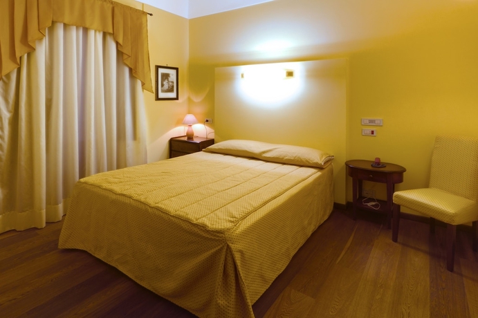 Imagen de la habitación del Hotel La Plumeria. Foto 8