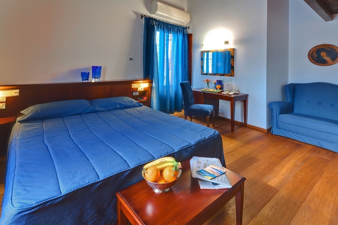 Imagen de la habitación del Hotel La Plumeria. Foto 12