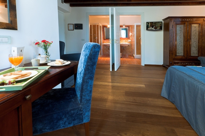 Imagen de la habitación del Hotel La Plumeria. Foto 13