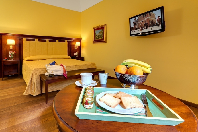 Imagen de la habitación del Hotel La Plumeria. Foto 14