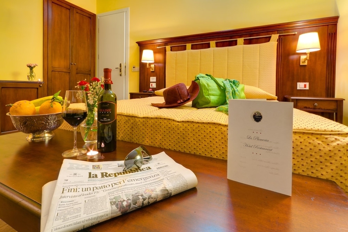 Imagen de la habitación del Hotel La Plumeria. Foto 17