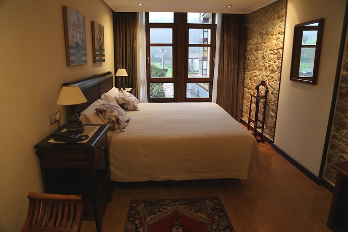 Imagen de la habitación del Hotel La Pontiga. Foto 8