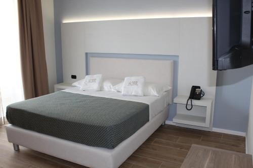 Imagen de la habitación del Hotel La Porta Del Sole. Foto 9