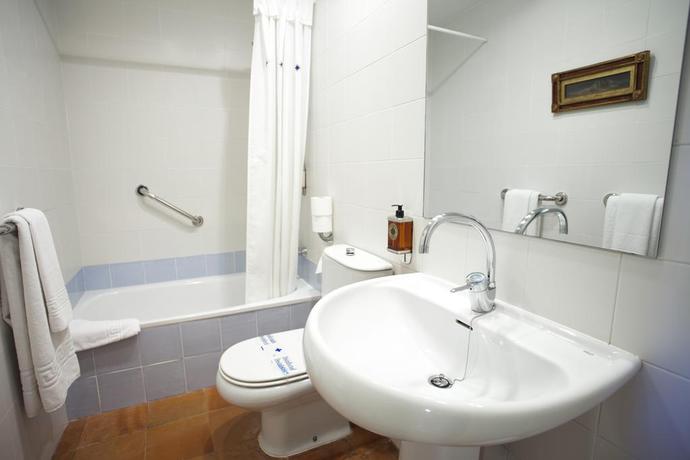 Imagen de la habitación del Hotel La Posada De Babel. Foto 9