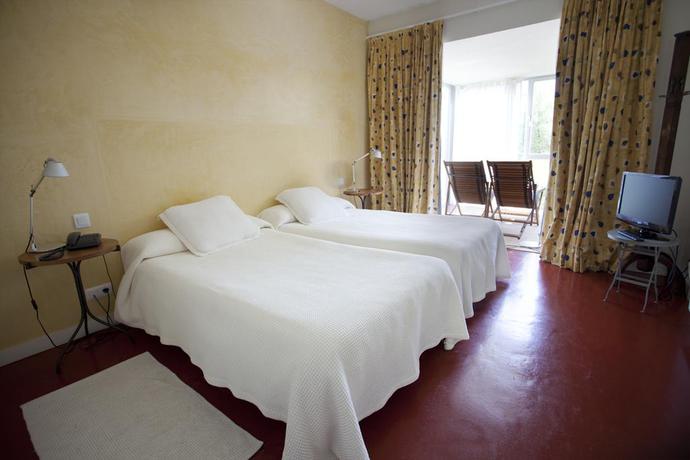 Imagen de la habitación del Hotel La Posada De Babel. Foto 12