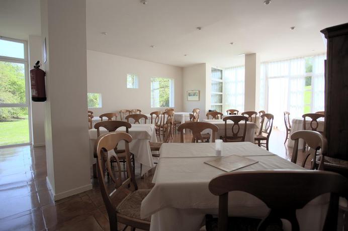 Imagen del bar/restaurante del Hotel La Posada De Babel. Foto 7