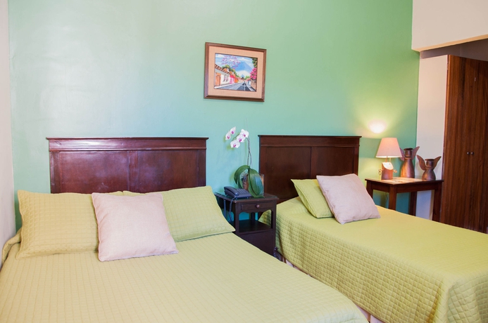 Imagen de la habitación del Hotel La Posada Del Angel, San Salvador. Foto 11