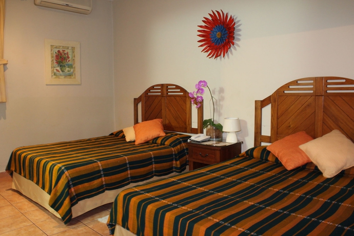 Imagen de la habitación del Hotel La Posada Del Angel, San Salvador. Foto 13