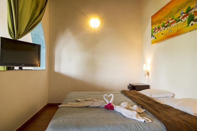 Imagen de la habitación del Hotel La Posada Del Sol. Foto 5