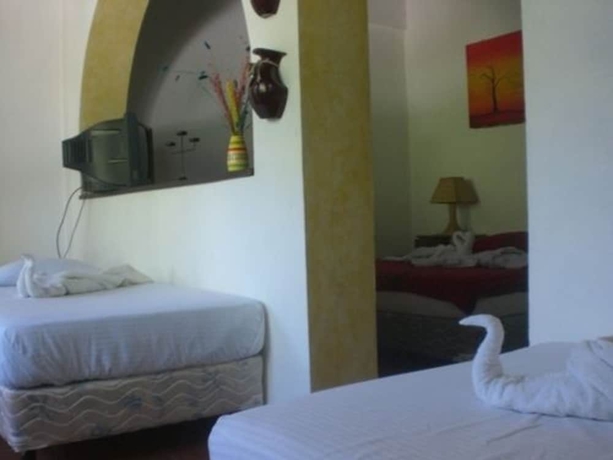 Imagen de la habitación del Hotel La Posada Del Sol. Foto 8