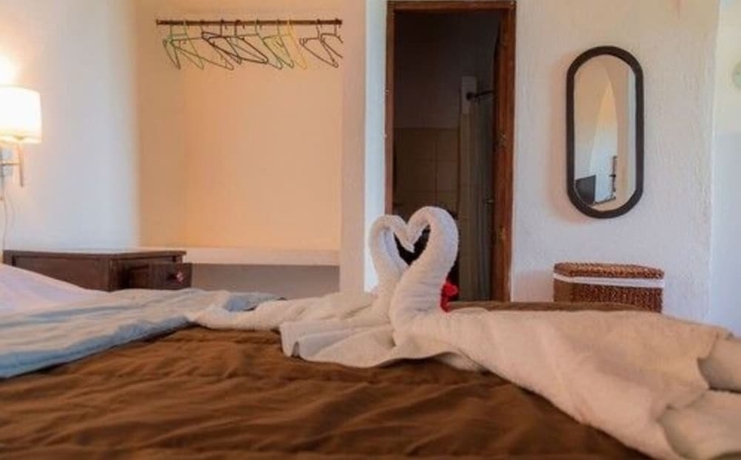 Imagen de la habitación del Hotel La Posada Del Sol. Foto 9