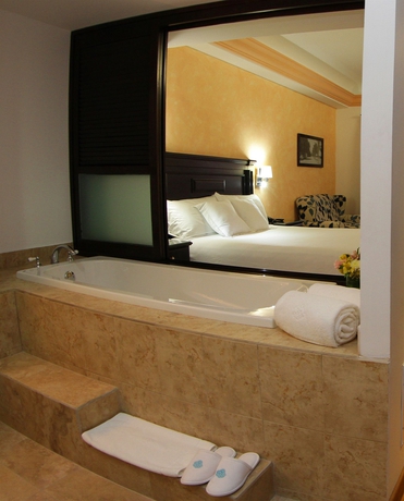 Imagen de la habitación del Hotel La Posada and Beach Club. Foto 4