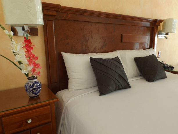 Imagen de la habitación del Hotel La Posada and Beach Club. Foto 5