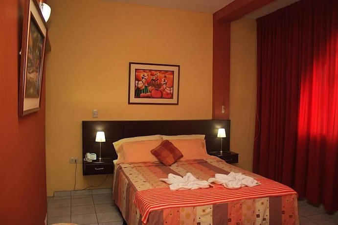 Imagen de la habitación del Hotel La Posada de Lobo and Suites. Foto 12