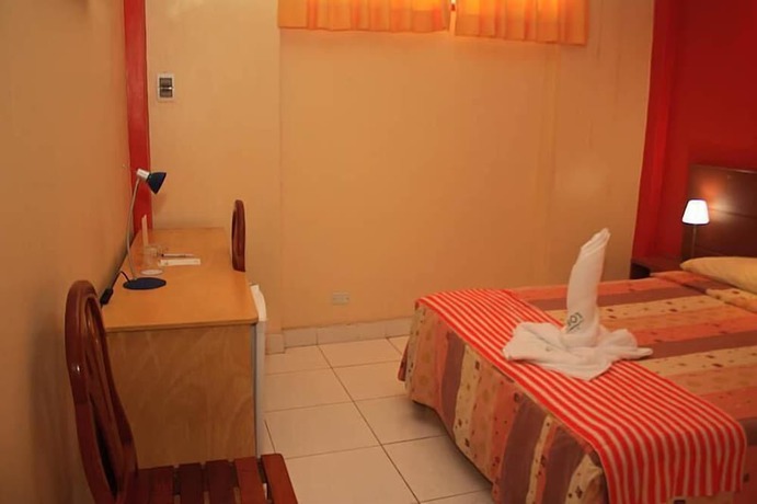 Imagen de la habitación del Hotel La Posada de Lobo and Suites. Foto 14