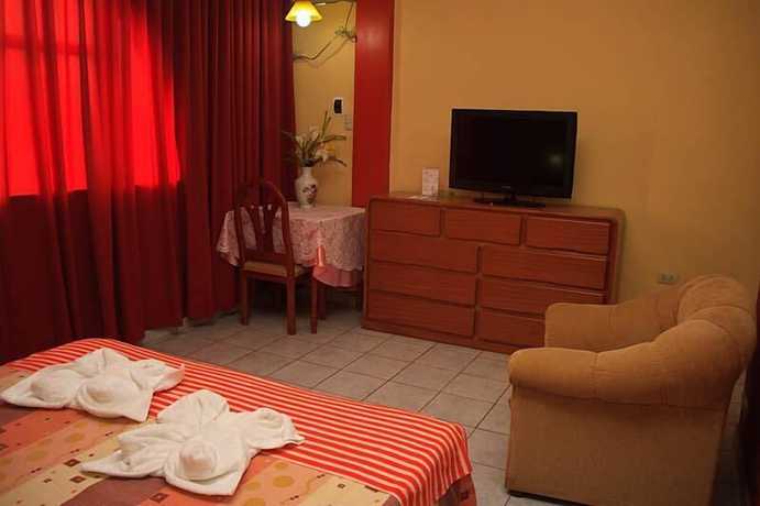 Imagen de la habitación del Hotel La Posada de Lobo and Suites. Foto 16