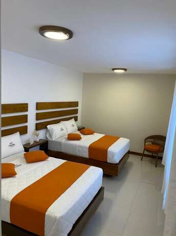 Imagen de la habitación del Hotel La Posada de Mindo. Foto 12