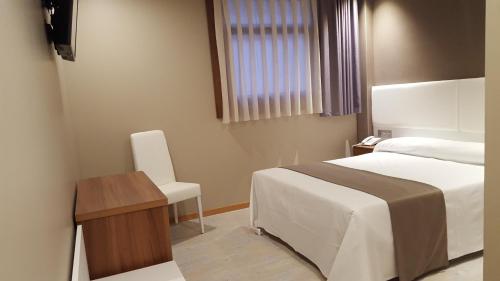 Imagen de la habitación del Hotel La Posada de Roces. Foto 8