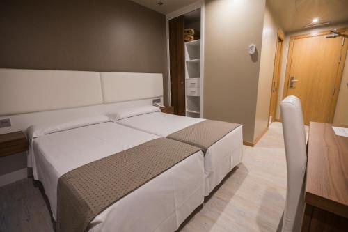 Imagen de la habitación del Hotel La Posada de Roces. Foto 9