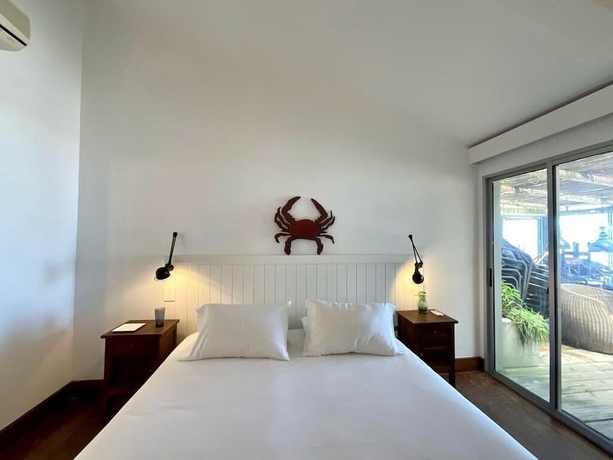 Imagen de la habitación del Hotel La Posta Beach. Foto 8