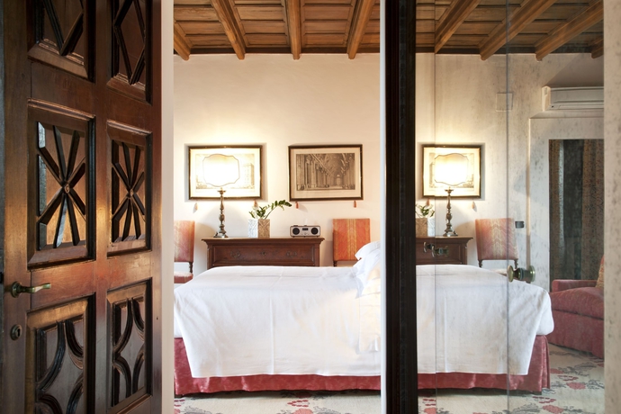 Imagen de la habitación del Hotel La Posta Vecchia. Foto 16