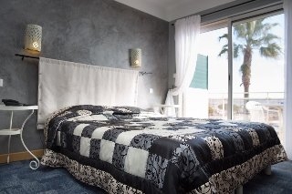 Imagen de la habitación del Hotel La Potiniere. Foto 4