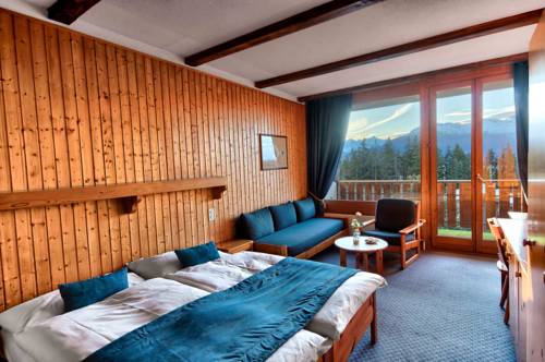 Imagen de la habitación del Hotel La Prairie. Foto 7