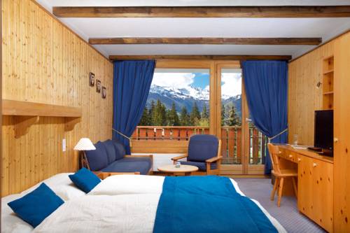 Imagen de la habitación del Hotel La Prairie. Foto 13