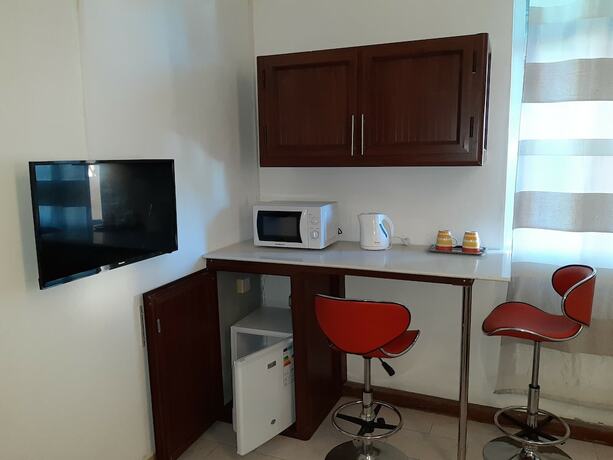 Imagen de la habitación del Hotel La Primerose. Foto 19
