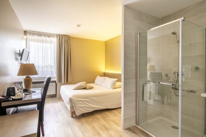 Imagen de la habitación del Hotel La Pyramide. Foto 11