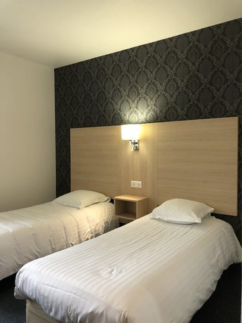 Imagen de la habitación del Hotel La Pyramide. Foto 14