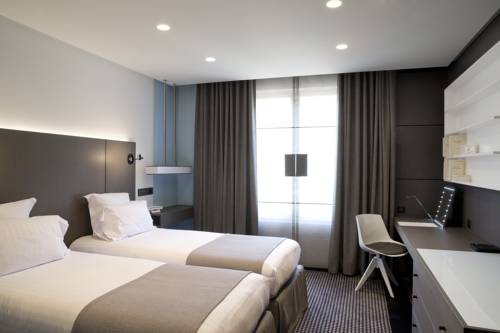 Imagen de la habitación del Hotel La Pyramide Patrick Henriroux. Foto 9