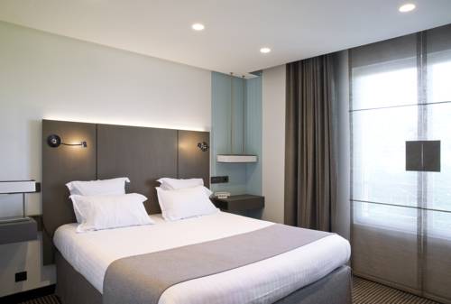 Imagen de la habitación del Hotel La Pyramide Patrick Henriroux. Foto 16