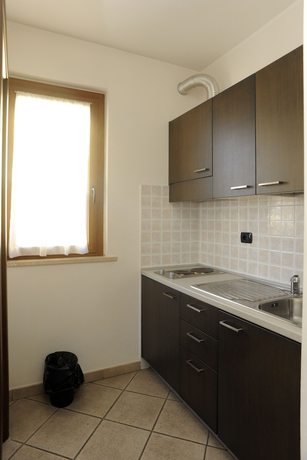 Imagen de la habitación del Hotel La Quercia, Villaggio Rinascita. Foto 7