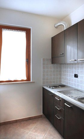 Imagen de la habitación del Hotel La Quercia, Villaggio Rinascita. Foto 9