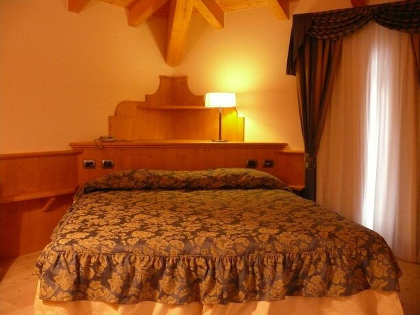 Imagen de la habitación del Hotel La Quiete Resort. Foto 17