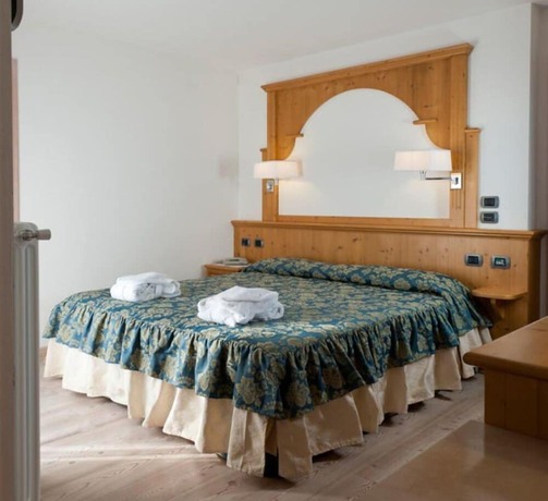 Imagen de la habitación del Hotel La Quiete Resort, Romeno. Foto 15