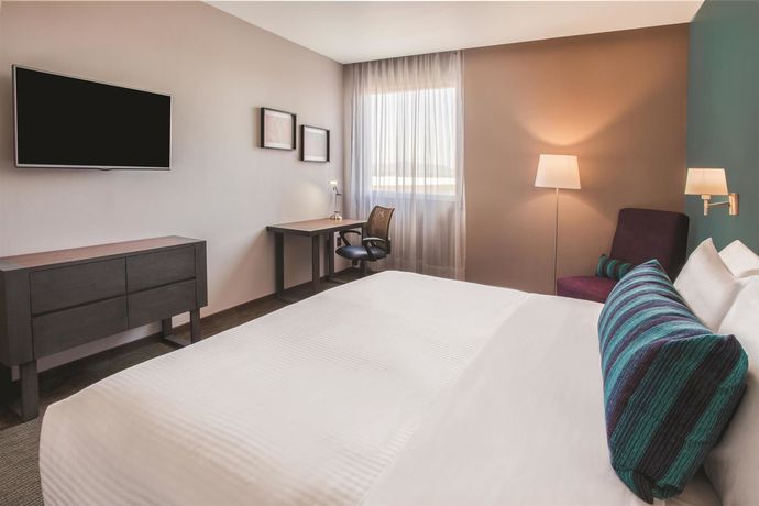 Imagen de la habitación del Hotel La Quinta By Wyndham Aguascalientes. Foto 10