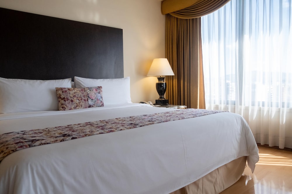 Imagen de la habitación del Hotel La Quinta By Wyndham Quito. Foto 3