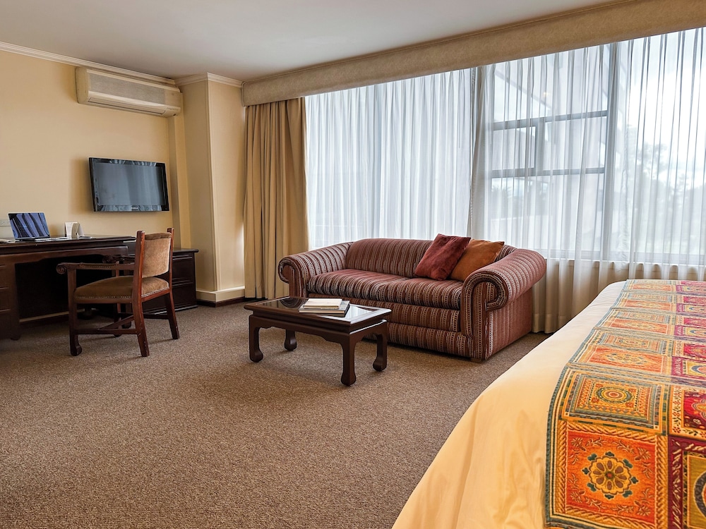 Imagen de la habitación del Hotel La Quinta By Wyndham Quito. Foto 9