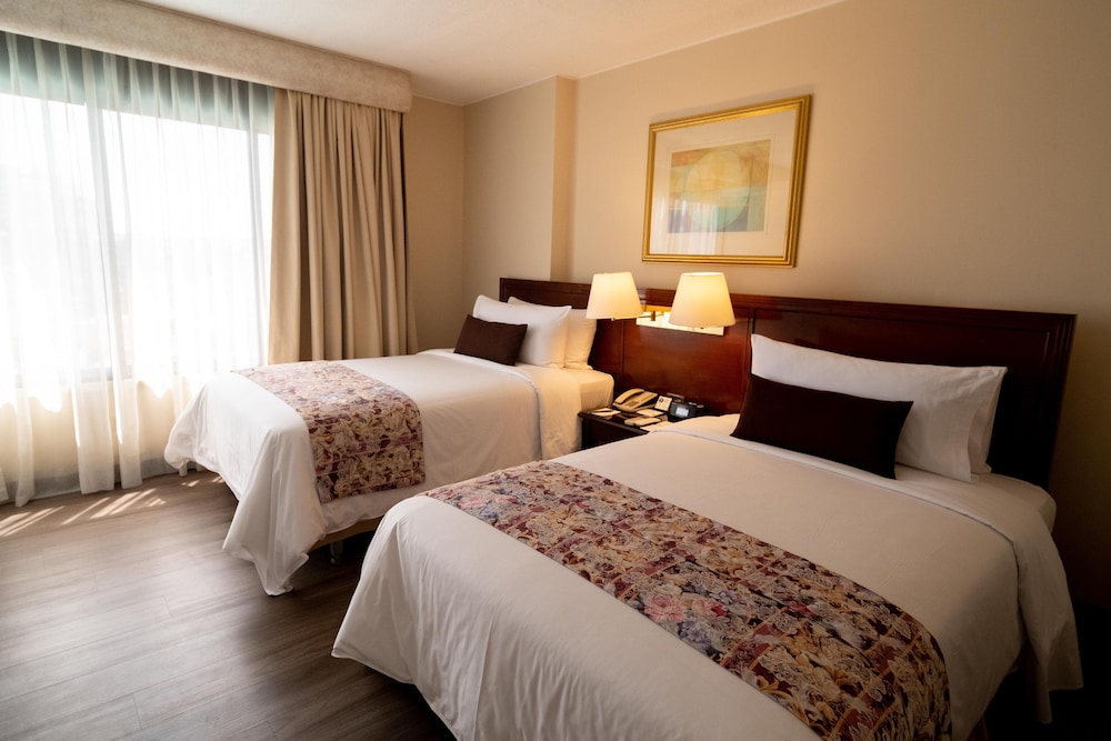 Imagen de la habitación del Hotel La Quinta By Wyndham Quito. Foto 10
