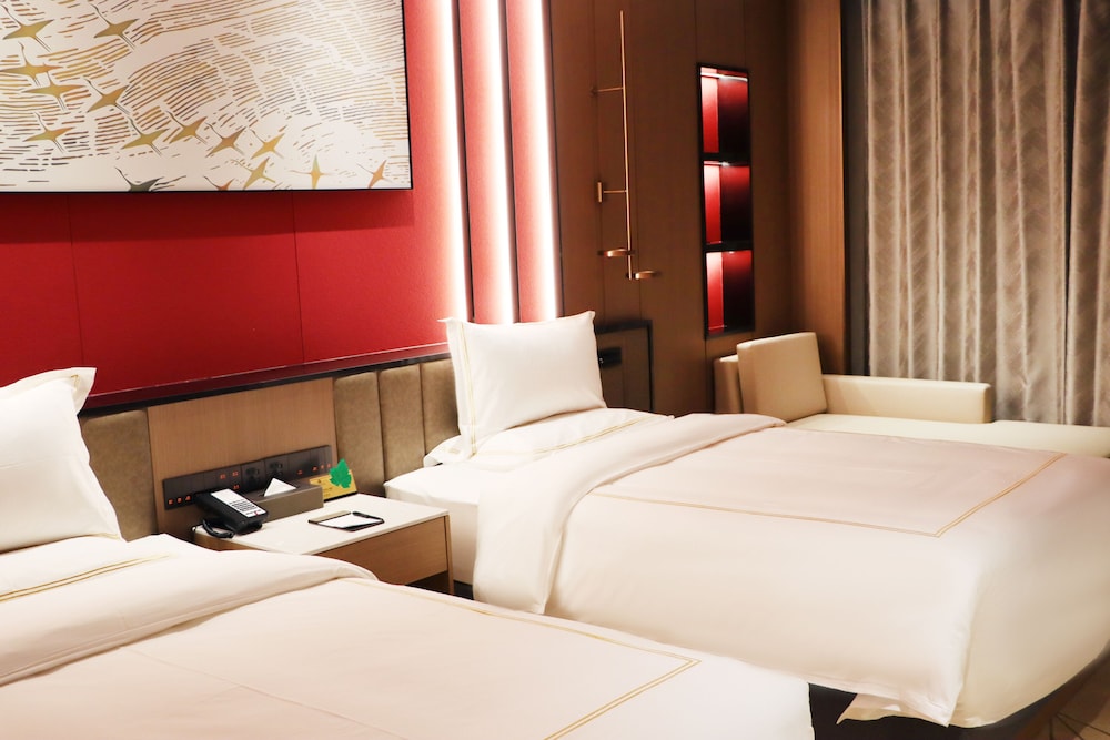Imagen de la habitación del Hotel La Quinta By Wyndham Weifang South. Foto 9