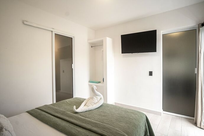 Imagen de la habitación del Hotel La Quinta Caribe&ntilde;a. Foto 17