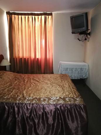 Imagen de la habitación del Hotel La Quinta De Allison And Backpackers. Foto 11
