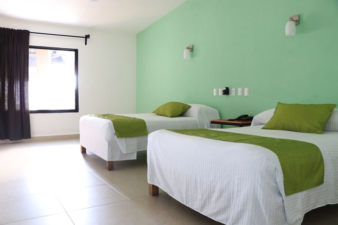 Imagen de la habitación del Hotel La Quinta Exxpres. Foto 7