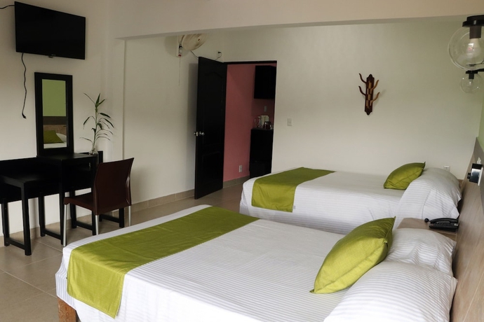 Imagen de la habitación del Hotel La Quinta Exxpres. Foto 9