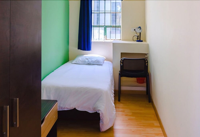 Imagen de la habitación del Hotel La Quinta - Hostel. Foto 2