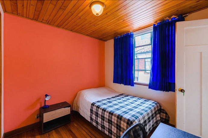 Imagen de la habitación del Hotel La Quinta - Hostel. Foto 3